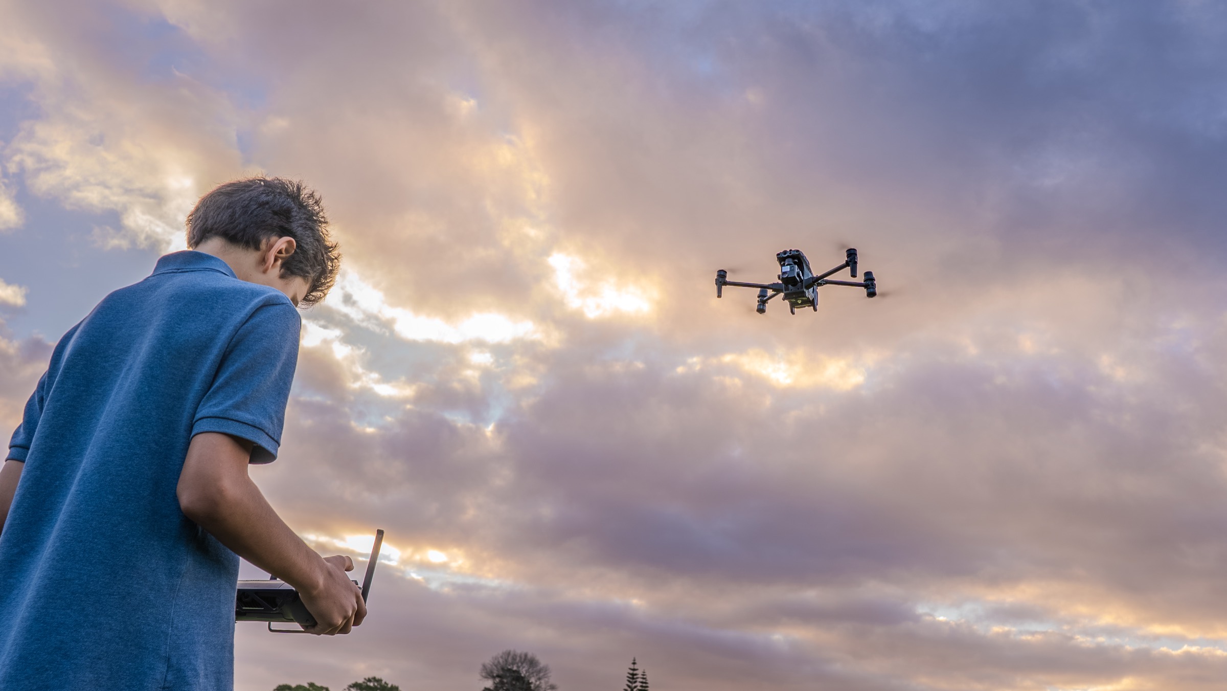 Marley flying his FPV drone at sunset
